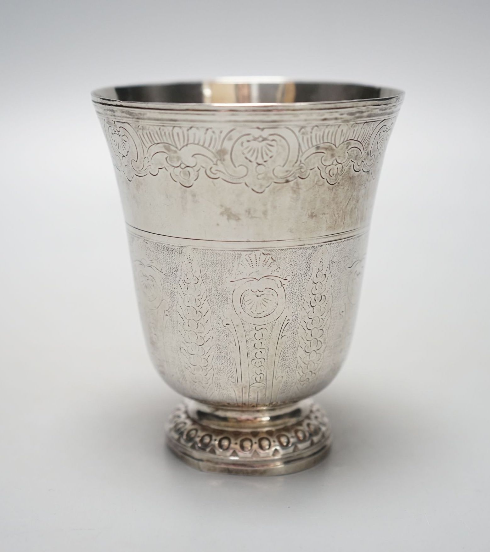 A 19th century French or Swiss engraved white metal beaker, 97mm, 90 grams.